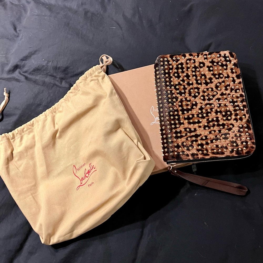 Louboutin iPad/tablet case leopard print pony fur with gold spikes